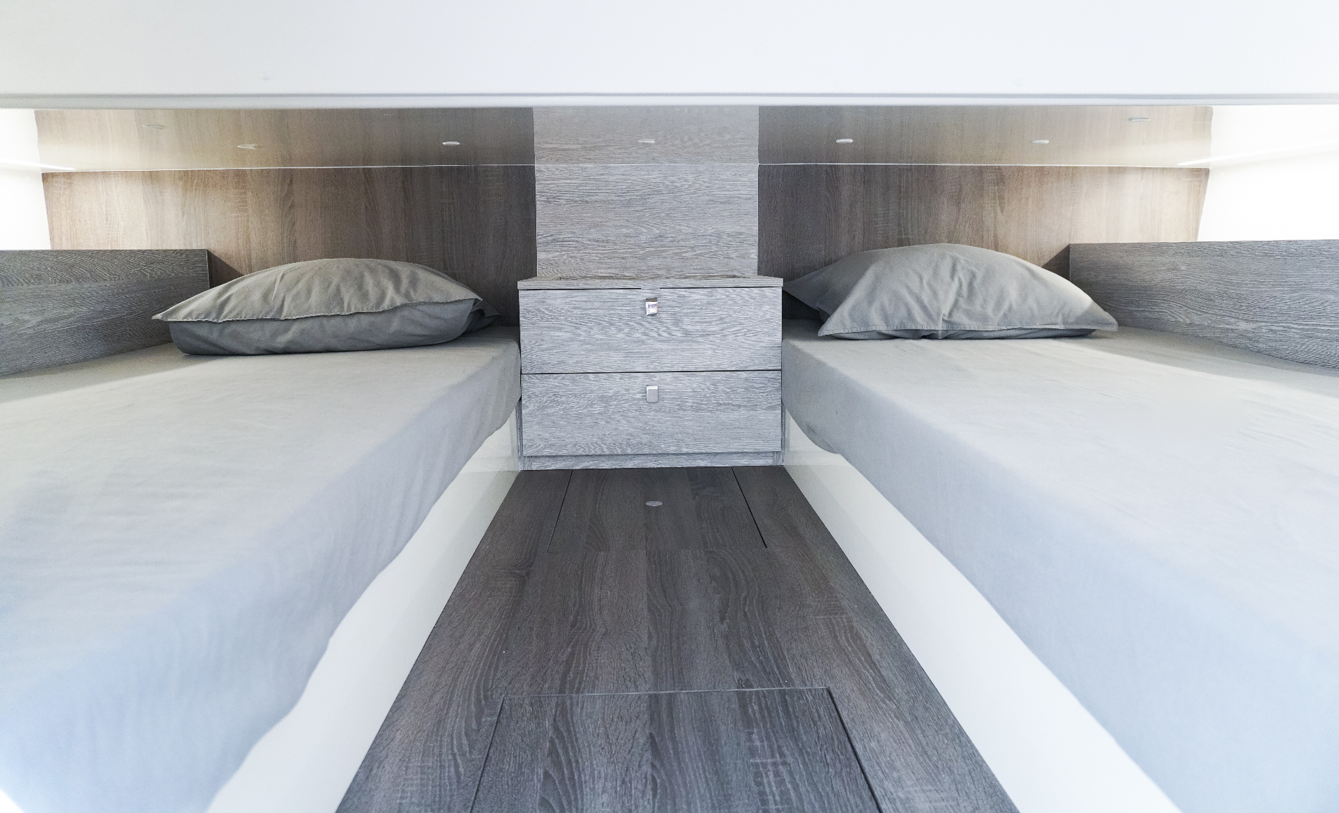 Convertible beds with ambient lighting.