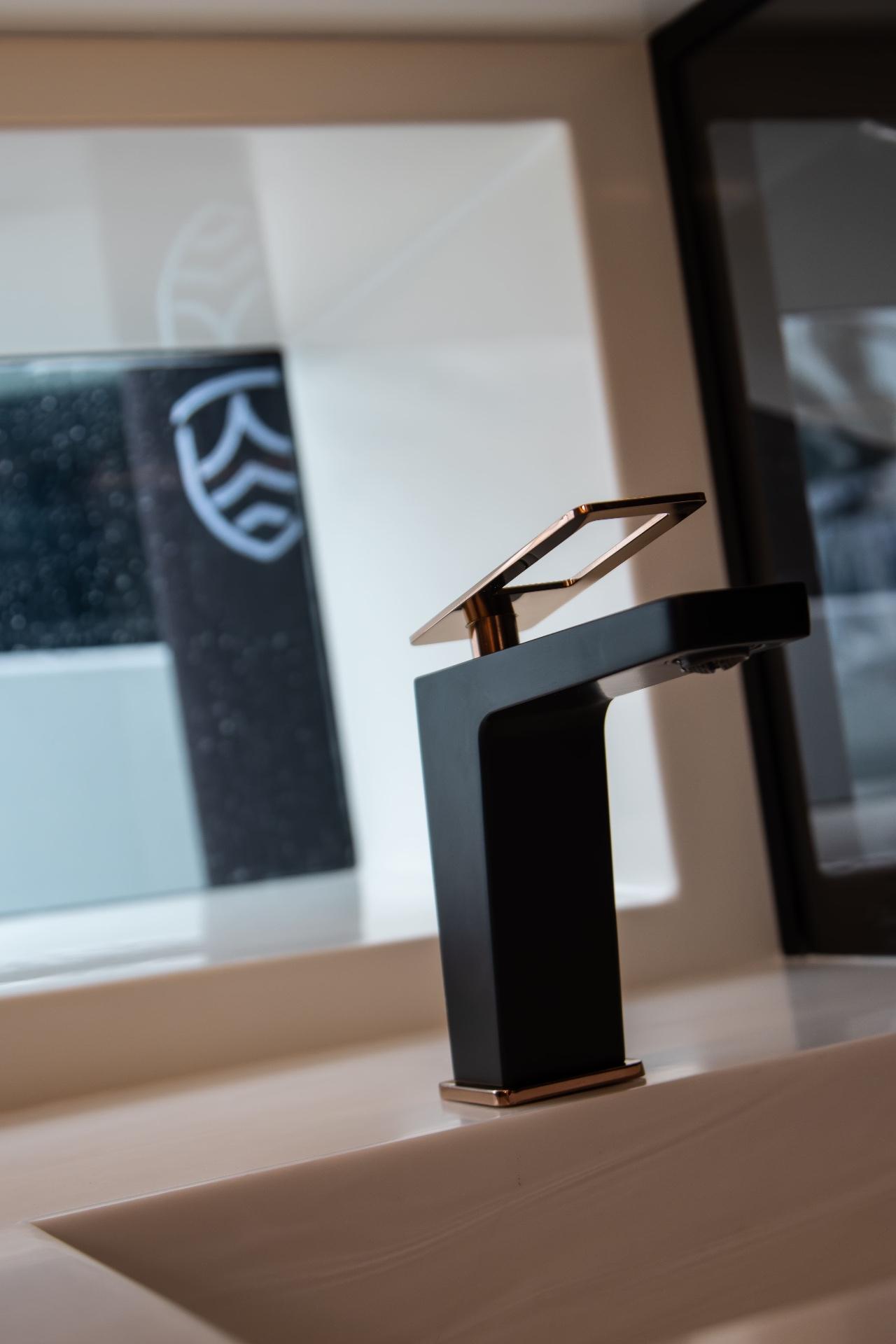 Designer faucet in matte black and copper.