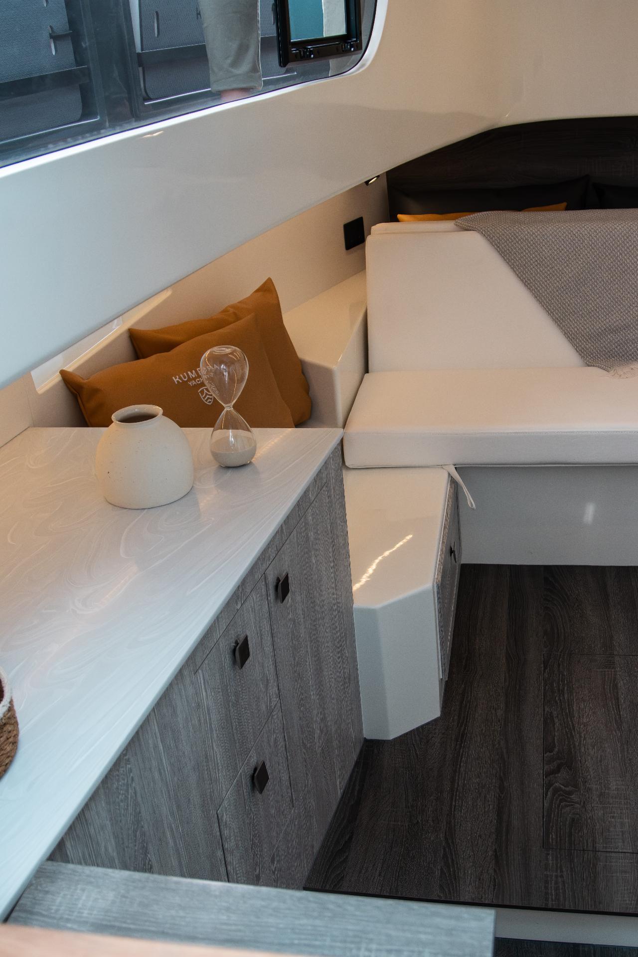 Reclining bed convertible into sofa and high-quality Corian furniture.